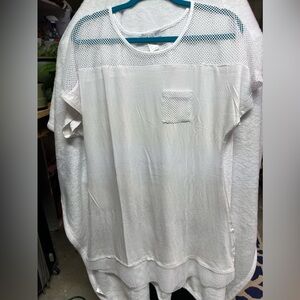 Silky soft coverup. White with mesh details.